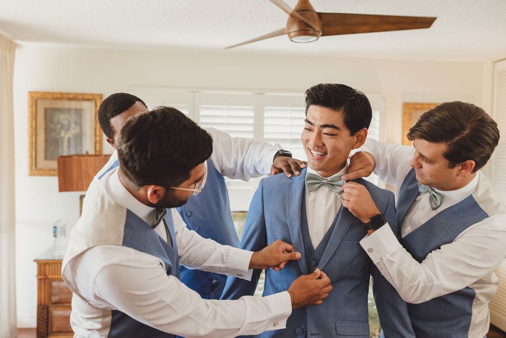 Two people in business attire engage in a heated discussion in an office setting with animated gestures.