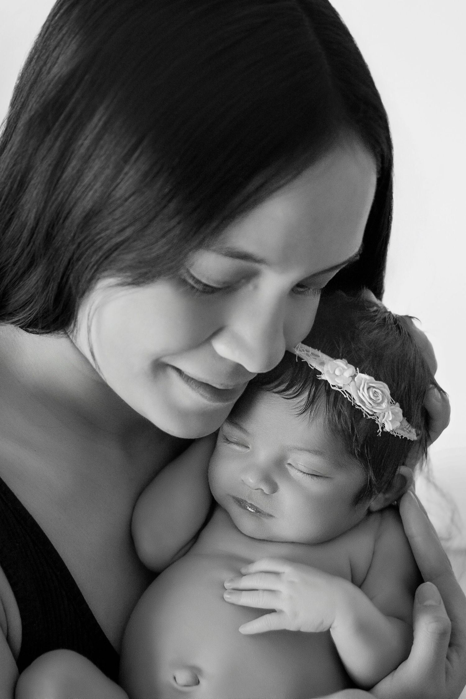 mother and baby posed beautifully in her photography session
