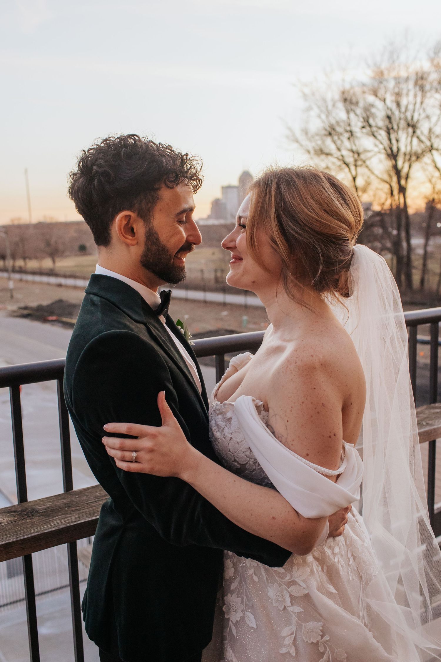 Romantic sunset wedding photoshoot sequence showing couple embracing on outdoor deck with golden light.