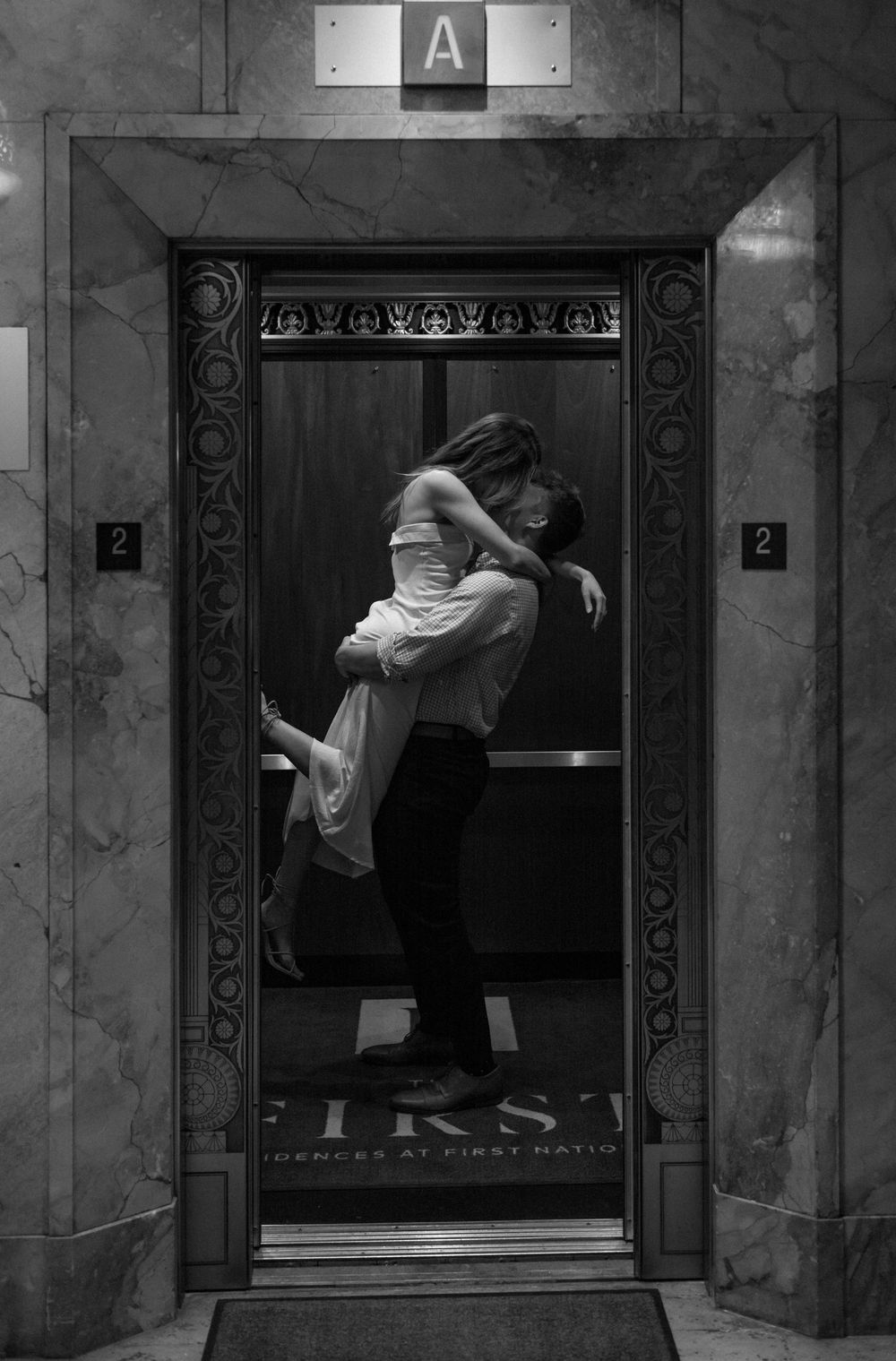 A sequence of three black and white photos showing a person entering and exiting an elevator in an art deco building.