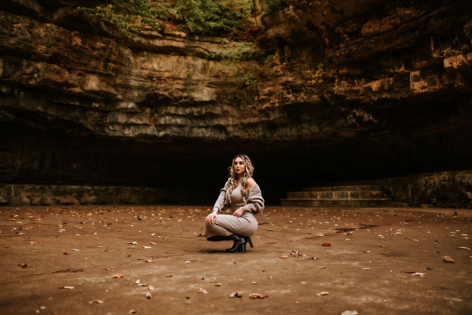 A Portrait of a woman posing in front of a cave formation in Clarksville, Tennessee.