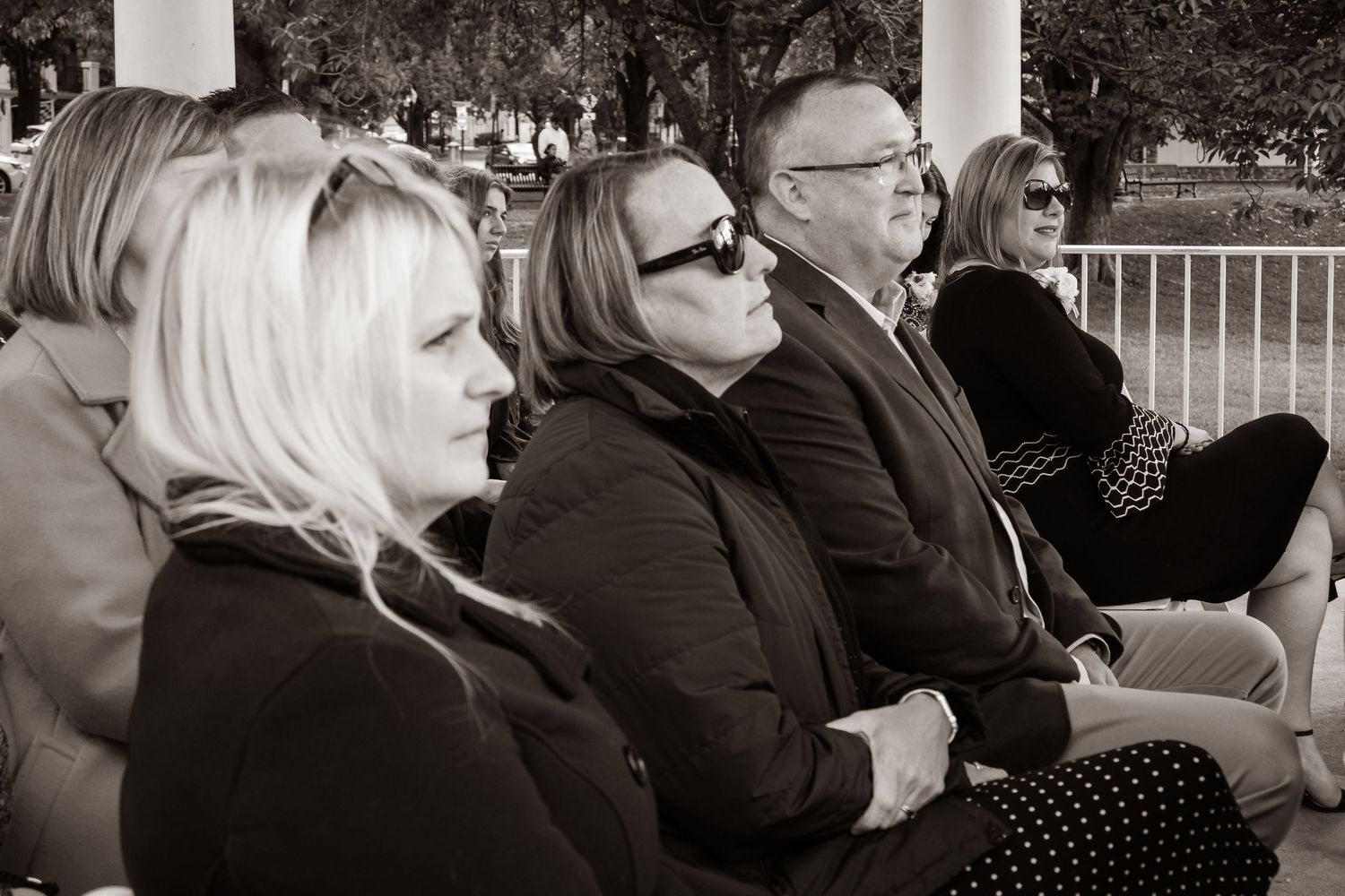frederick maryland wedding photographer Wedding guests seated in rows during an outdoor autumn ceremony.