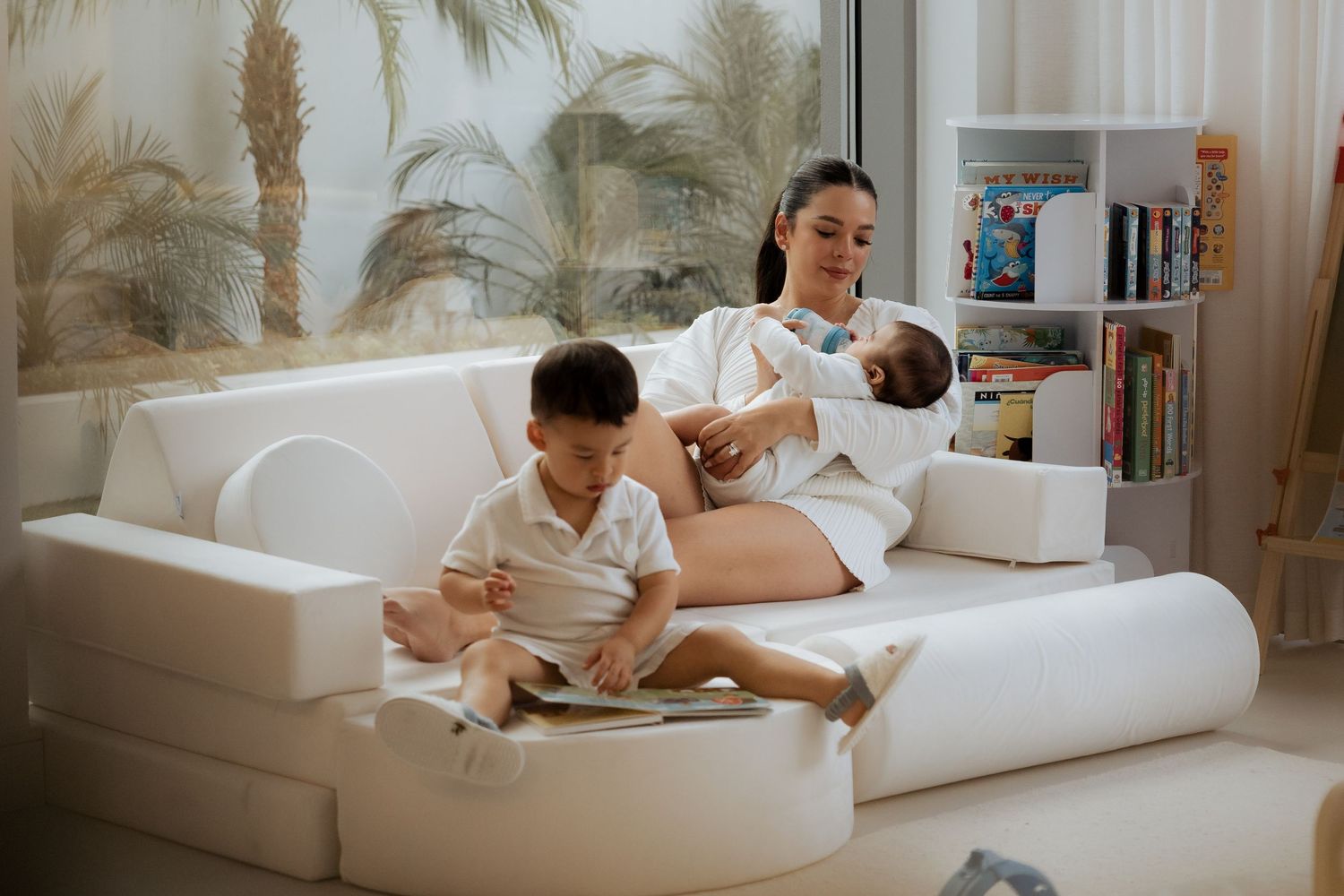 Lifestyle family photography session at home capturing joyful moments between parents and children