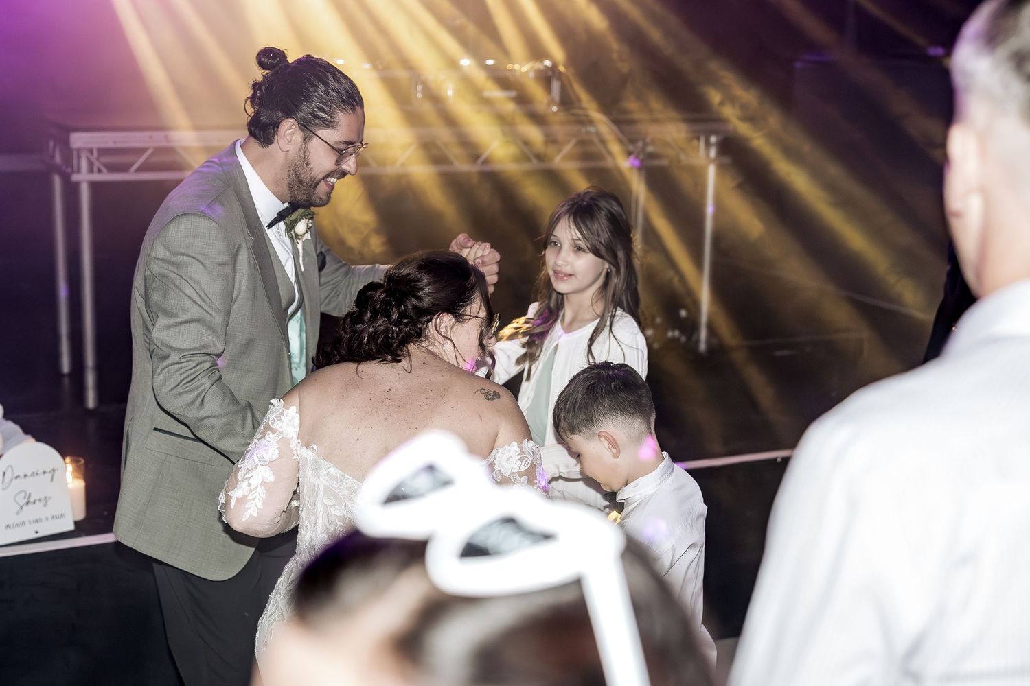 Unobtrusive documentary wedding photography capturing reactions.