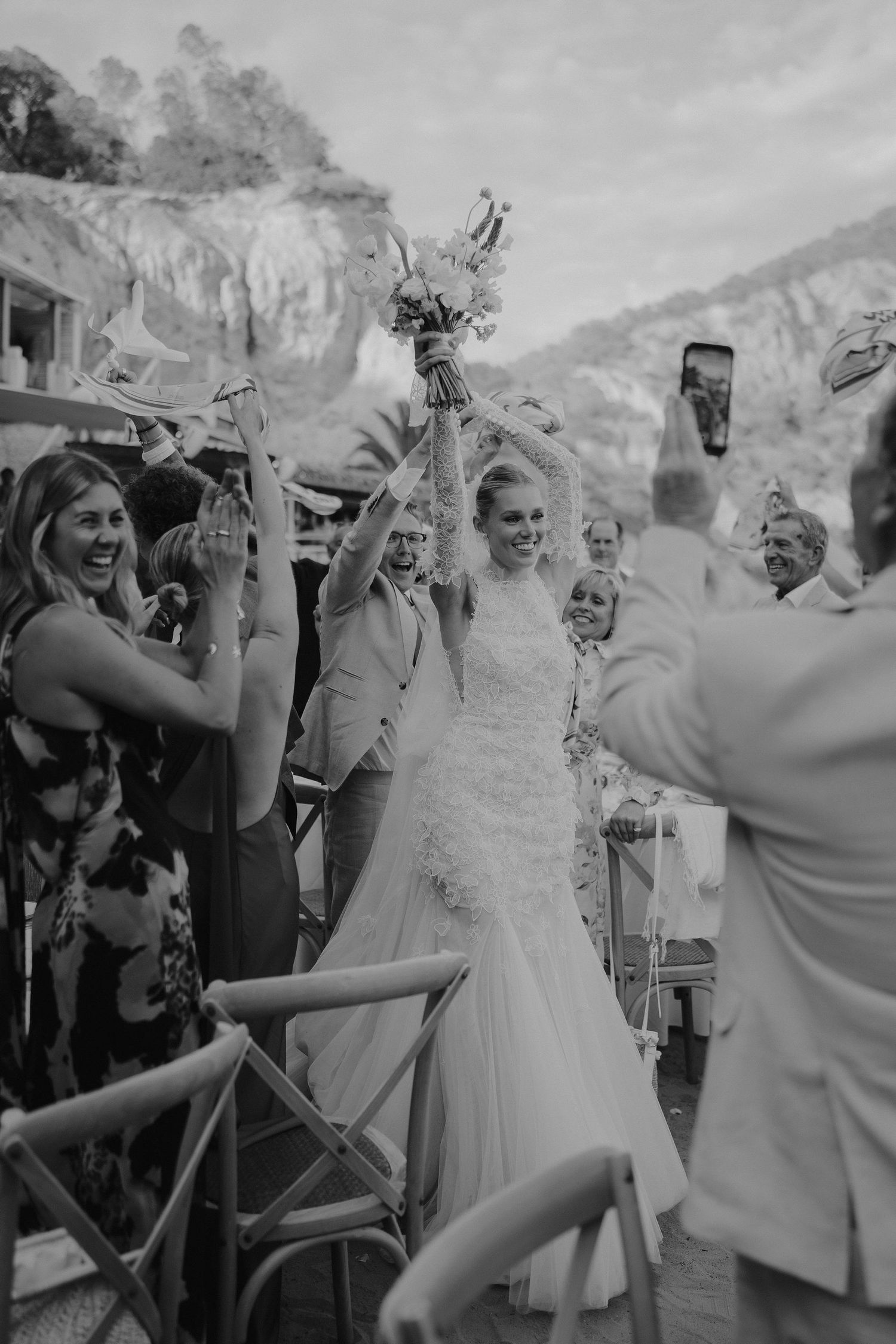wedding guests cheering bride and grooms entrance to wedding breakfast at amante ibiza