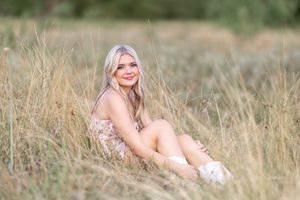 Candid moments captured in a natural field setting during golden hour.