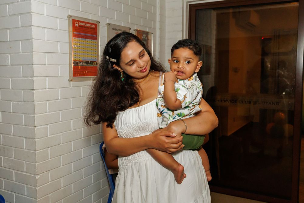 Tender moment captured in hallway during special celebration event.