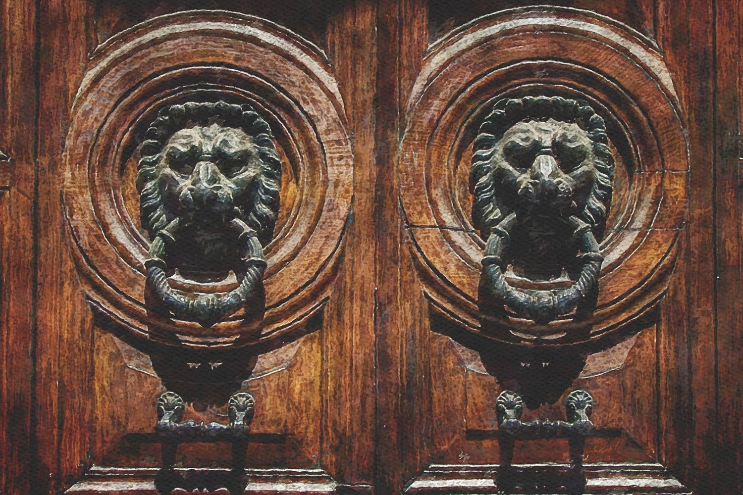 Vintage ornate lion head door knockers mounted on dark wooden door panels in Rome.