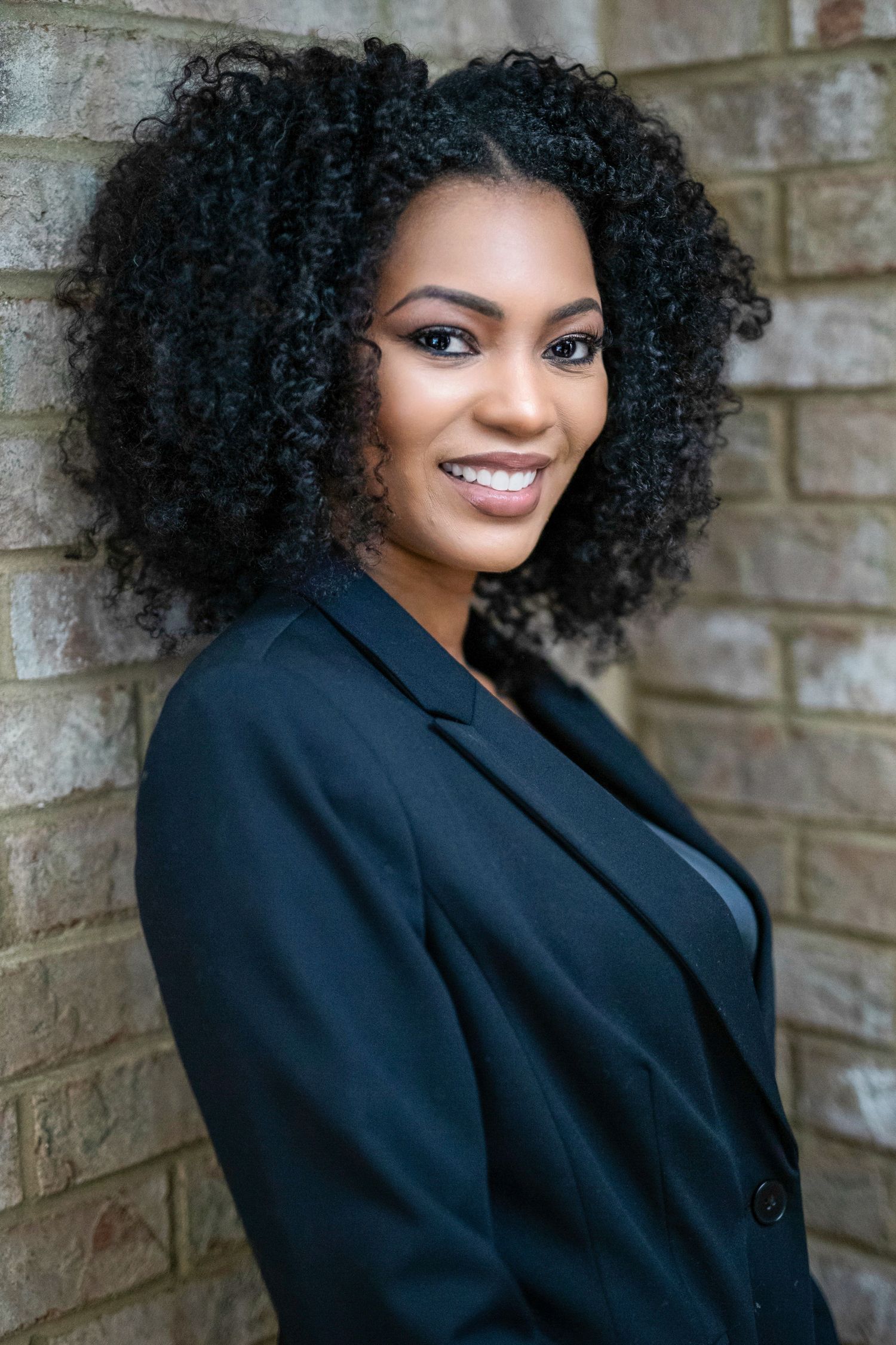 Professional corporate headshot with clean background for business branding, photo by local photographer Windsor Ontario.