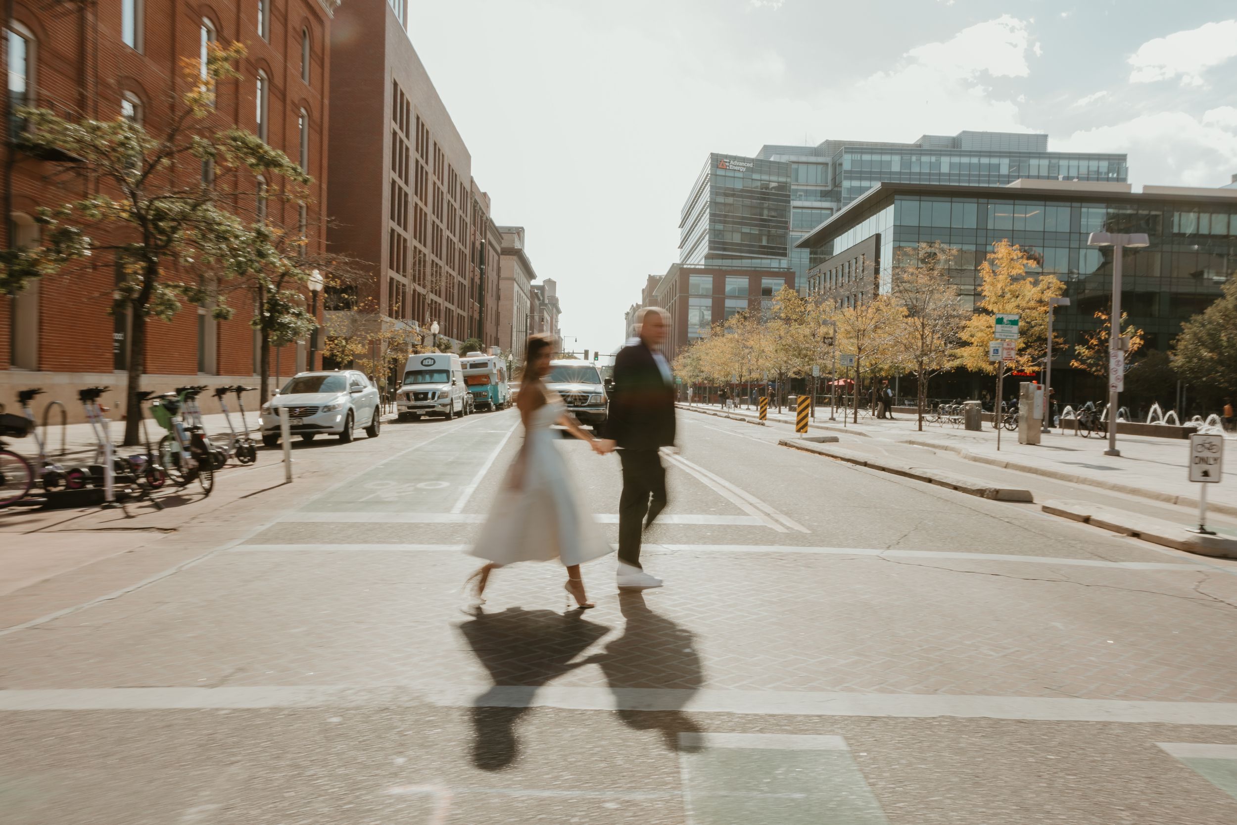 Urban street scenes showing buildings and sidewalks from multiple angles during daytime.