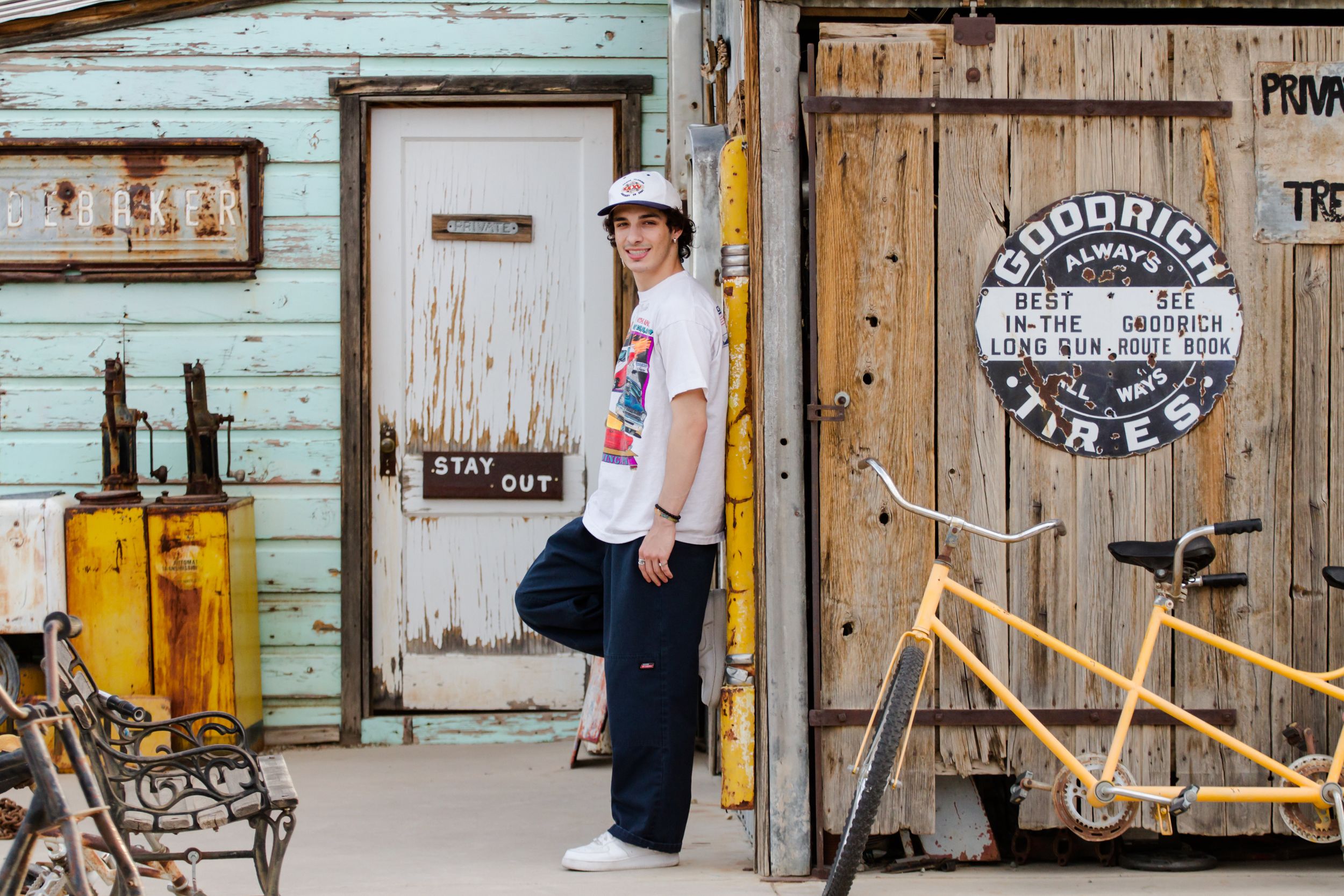 Teen boy posing in nelson ghost town