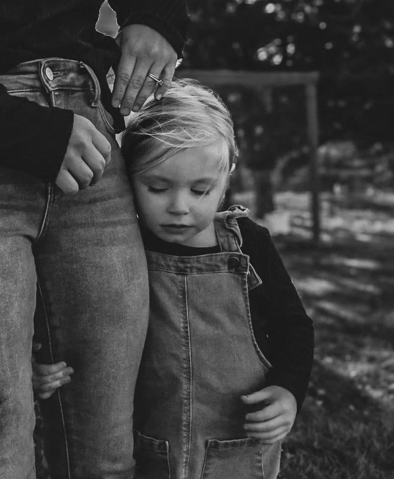 Artistic close-up shot focusing on denim jeans and casual poses.