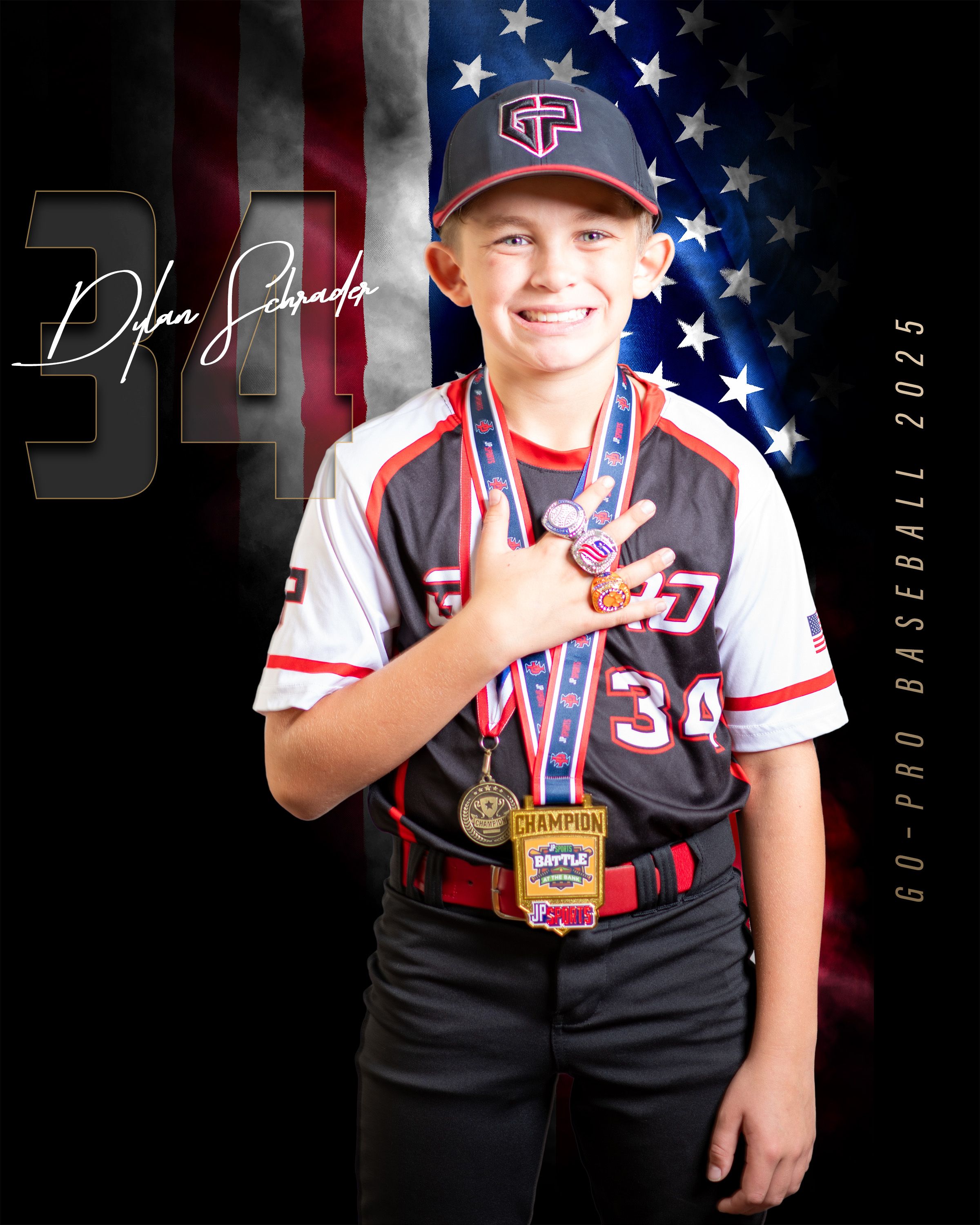 Baseball player in patriotic uniform with medals poses in front of American flag background.