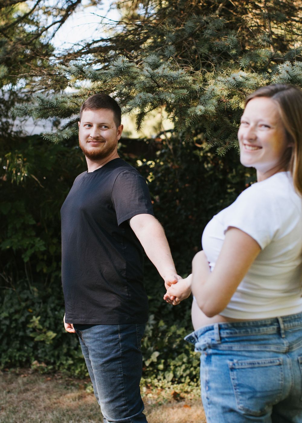 David gazing at Hannah during their lifestyle maternity session in Flint, Michigan
