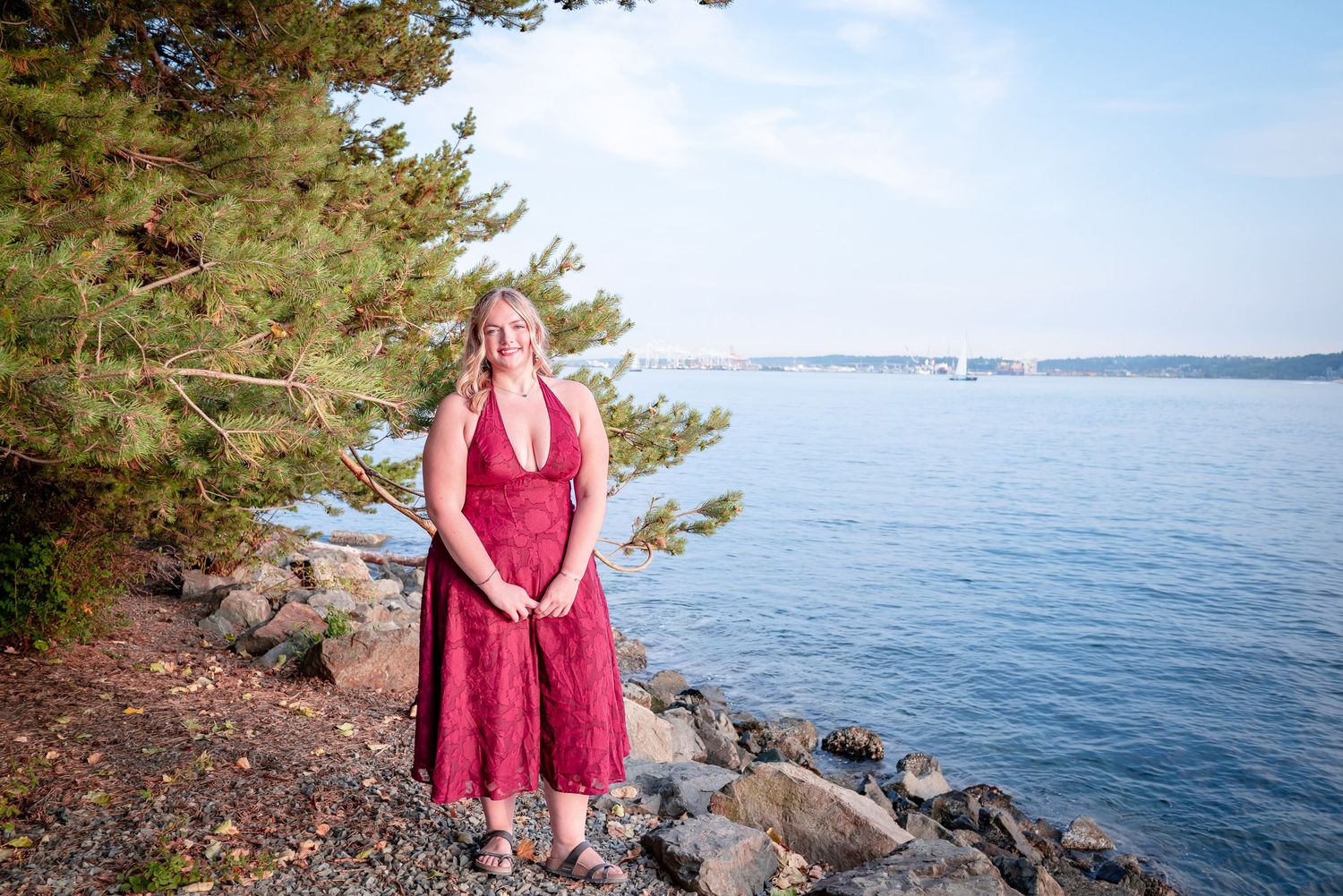 Close-up senior portrait overlooking Elliott Bay near Olympic Sculpture Park at the Pocket Beach.