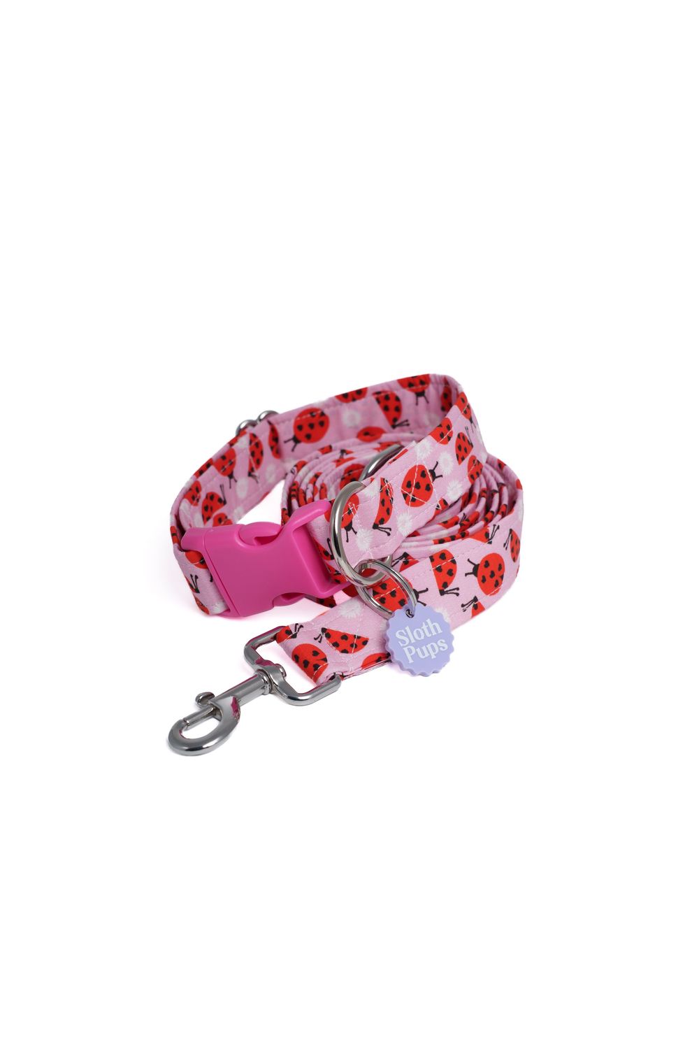 Pink ladybug print dog collar and leash set with hot pink buckle and silver snap hook clasp.