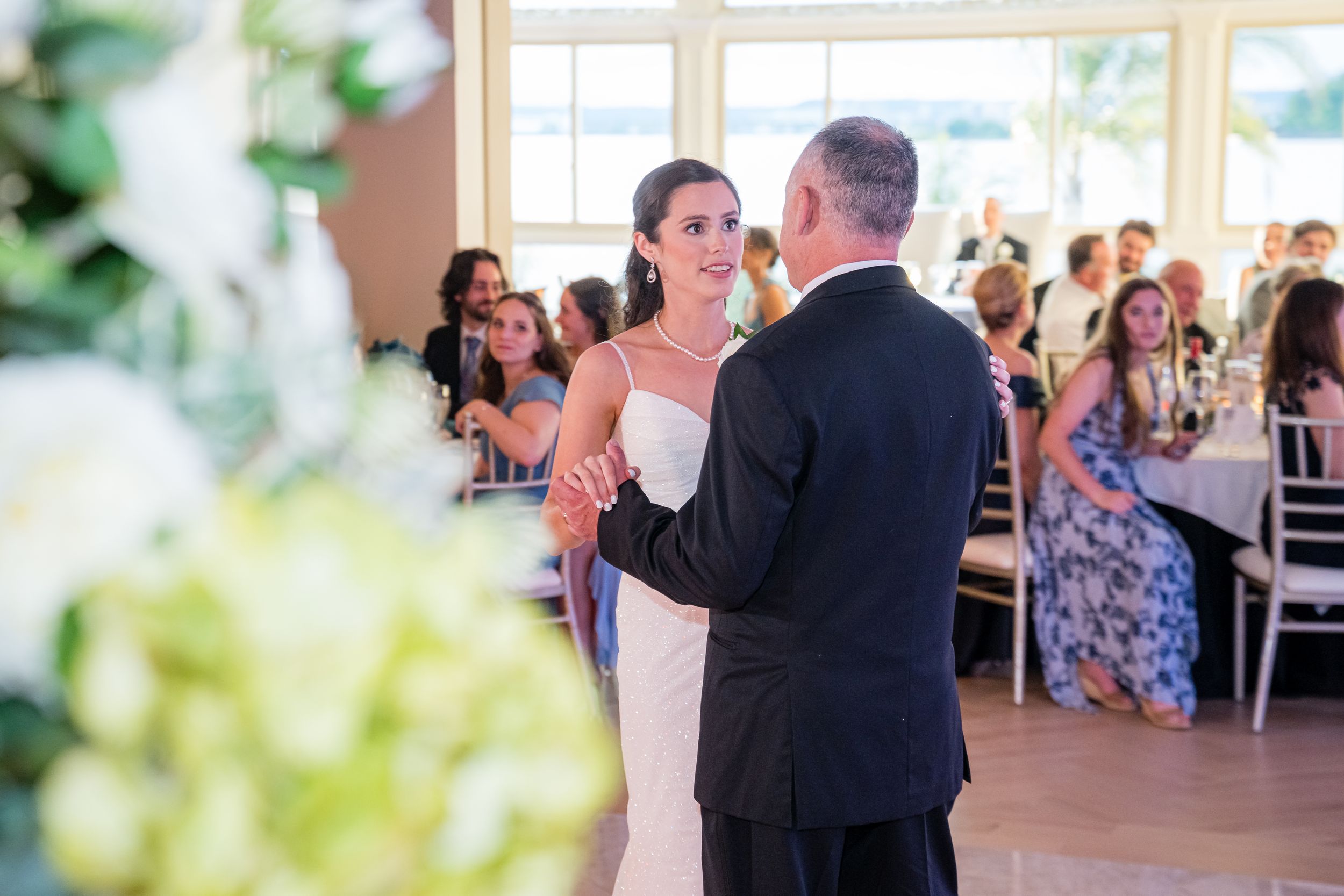 Combining wide venue photographs with candid moments tells the complete story of an event.