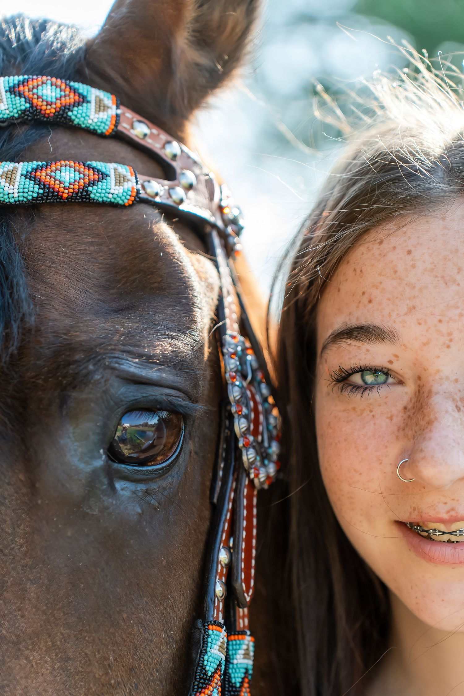 close up of a girl with her horse