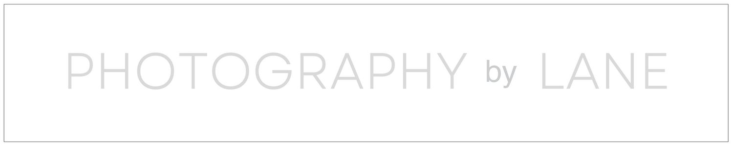 Photography by Lane logo displayed in light gray text on a white background with a simple rectangular border.