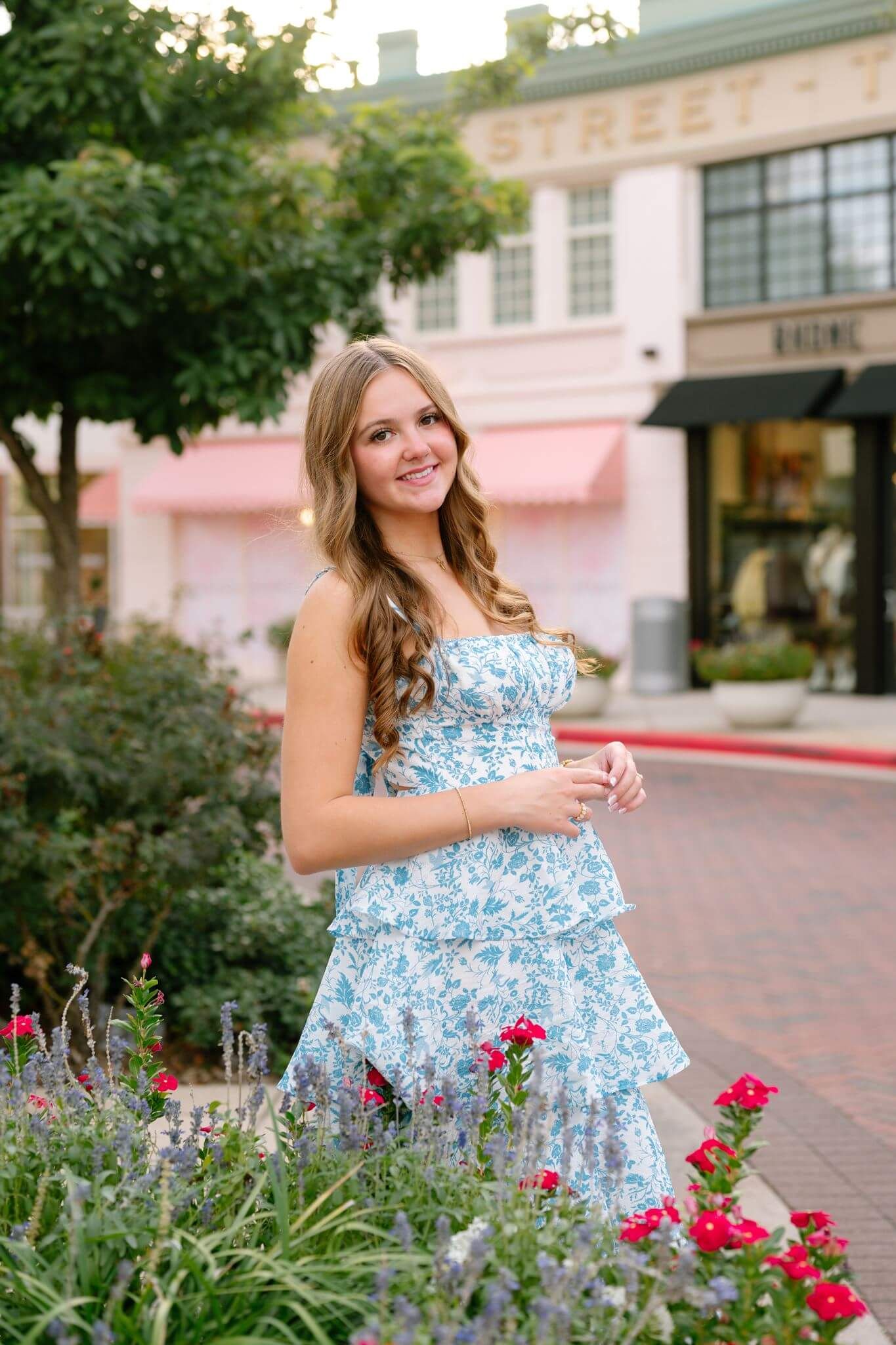 Oak Ridge HS senior girl posing at Market Street in The Woodlands Texas