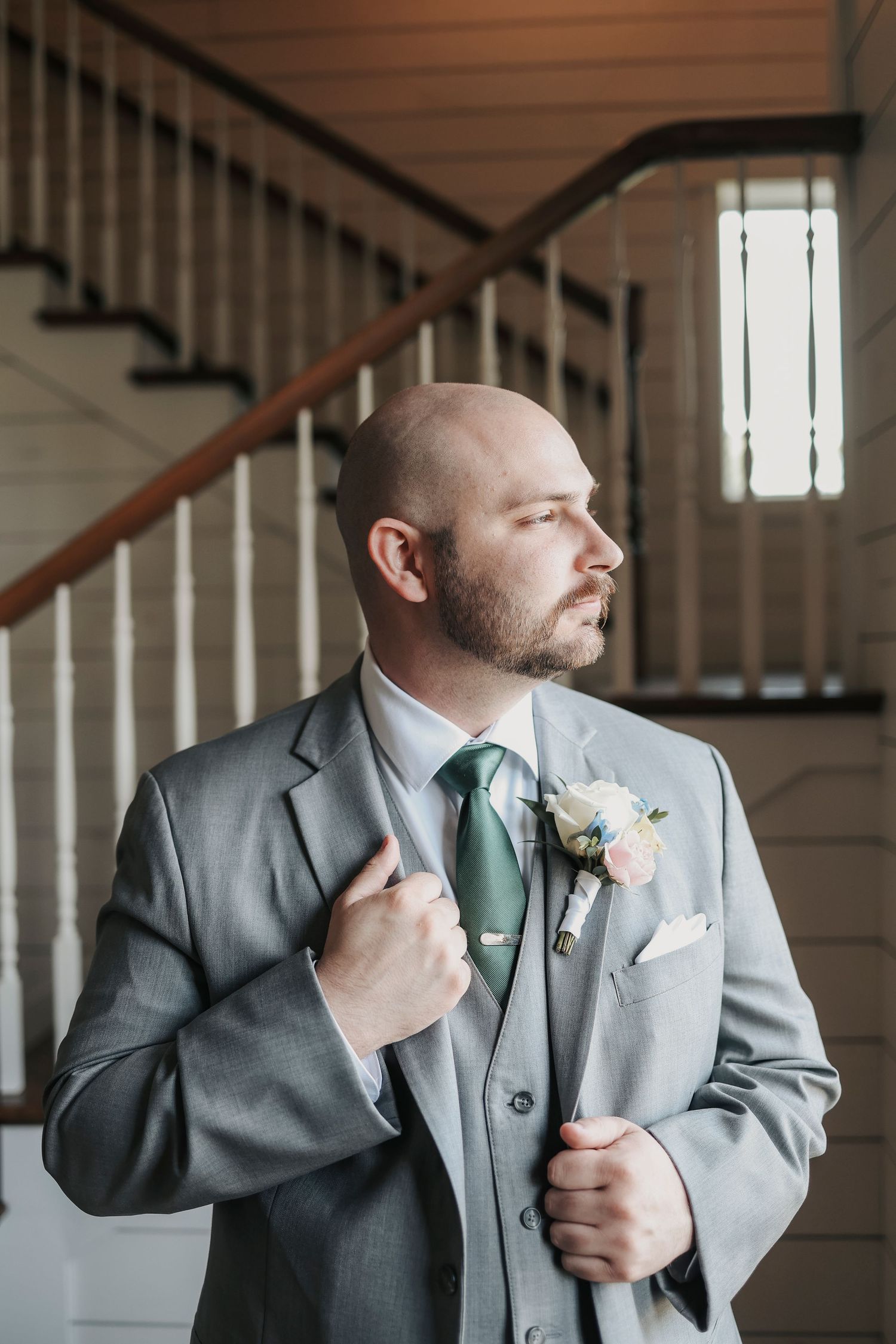 Groom getting ready for his wedding at The French Farmhouse in Collinsville Texas