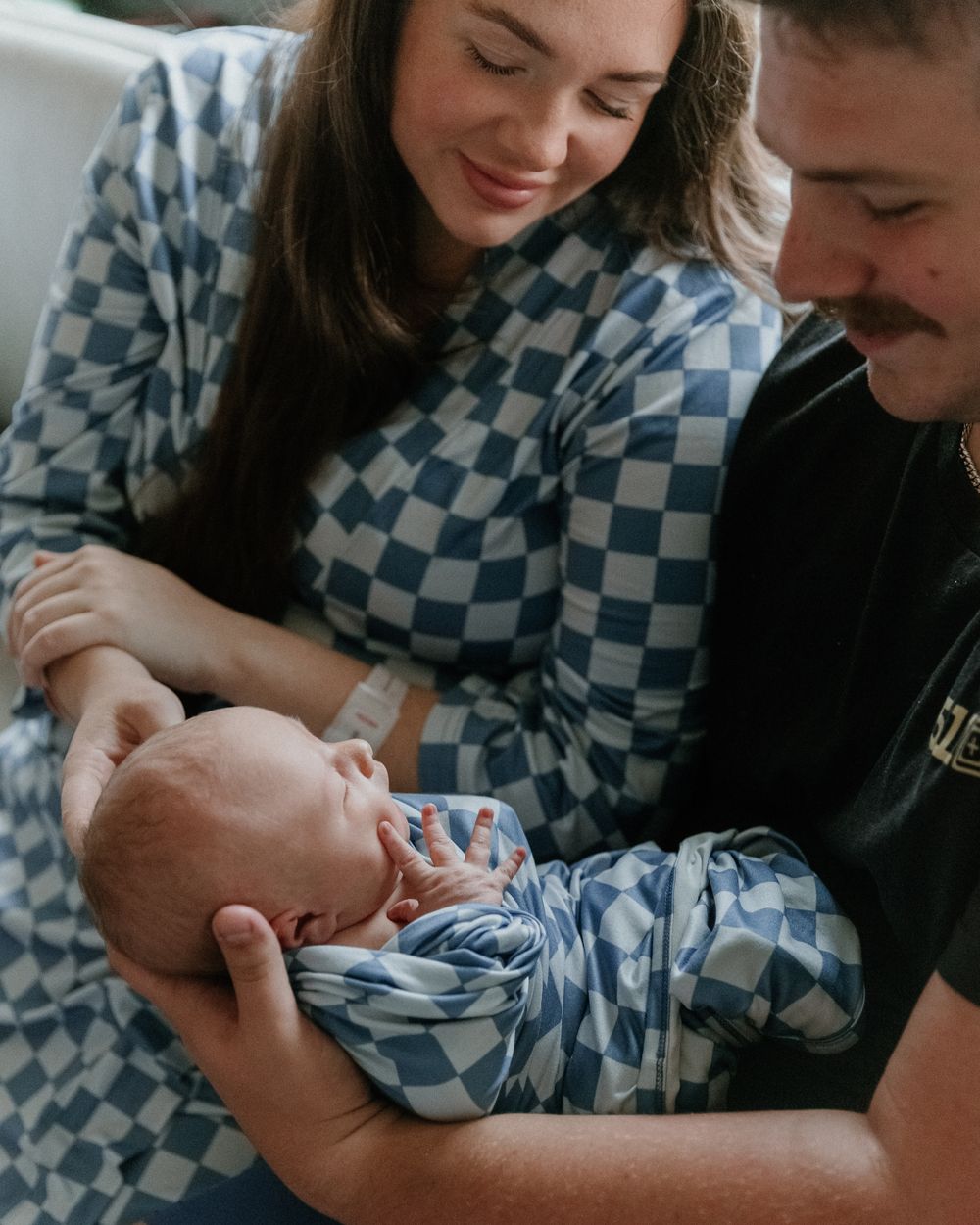 Mom and dad adoring newborn baby during fresh 48 session in Tyler Tx hospital