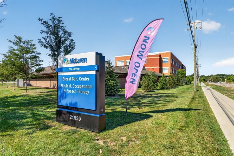 McLaren Welcome sign for Breast Care Center and Physical, Occupational & Speech Therapy, with Now Open banner.