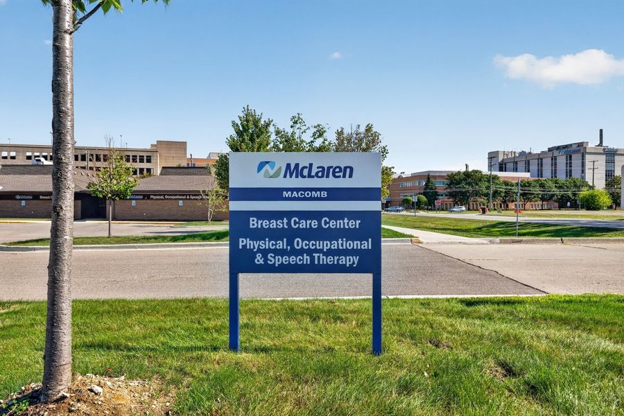 McLaren Macomb sign for Breast Care Center and Physical, Occupational & Speech Therapy services outdoors.