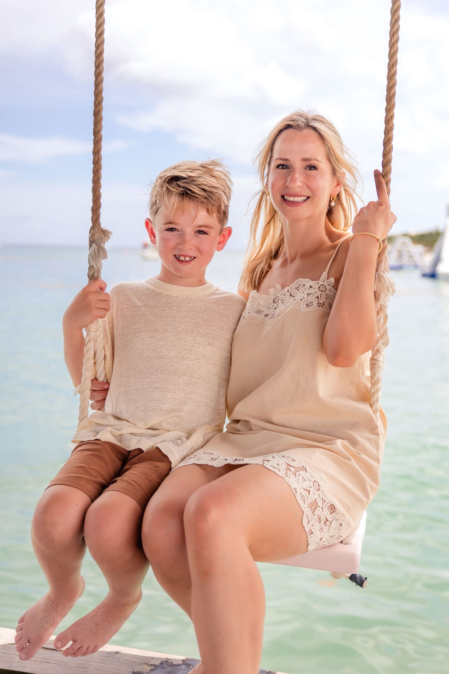 Happy family photoshoot posing  on a sunny day in Paradise beach cozumel