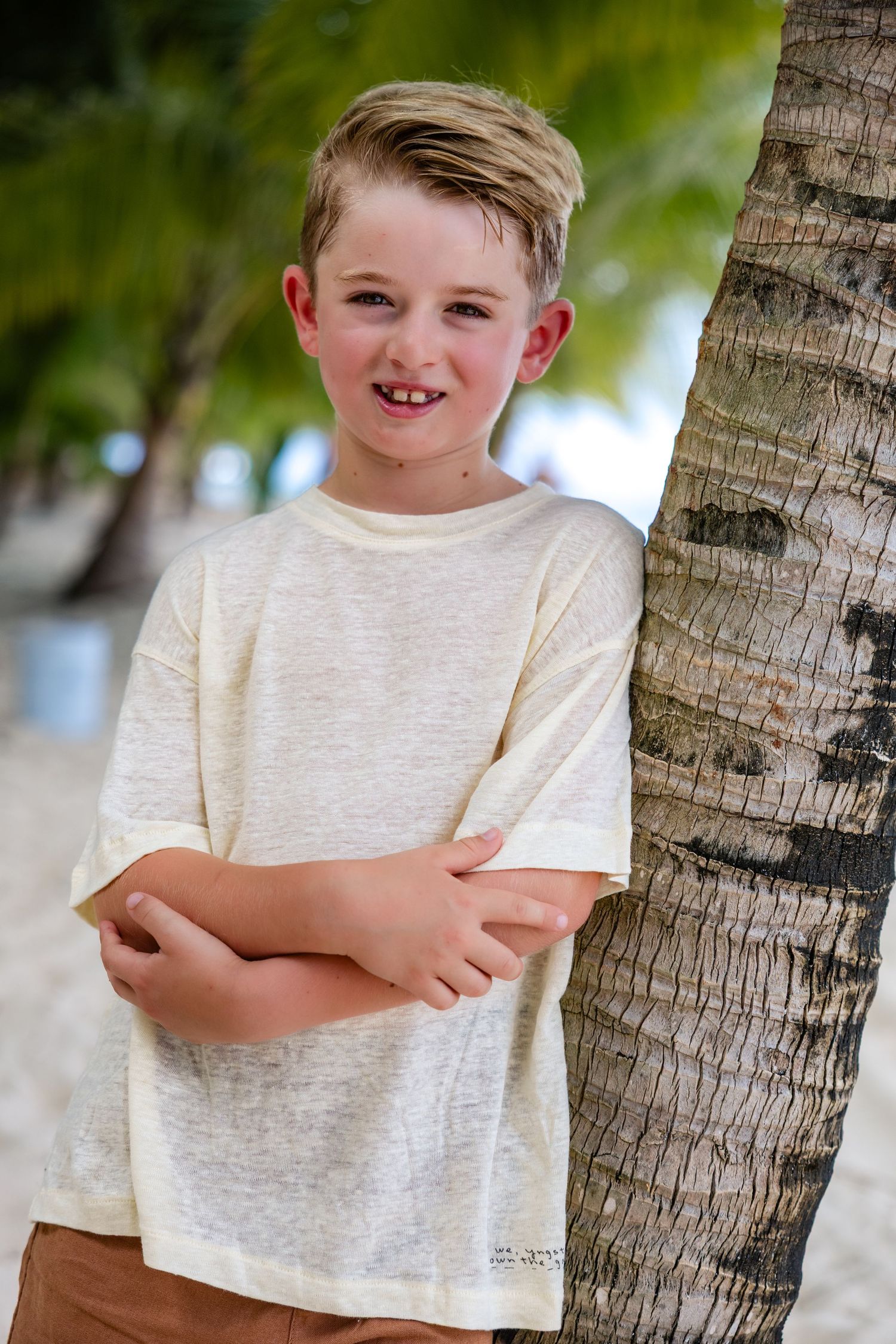 A smiling boy portrait at paradise beach cozumel photoshoot