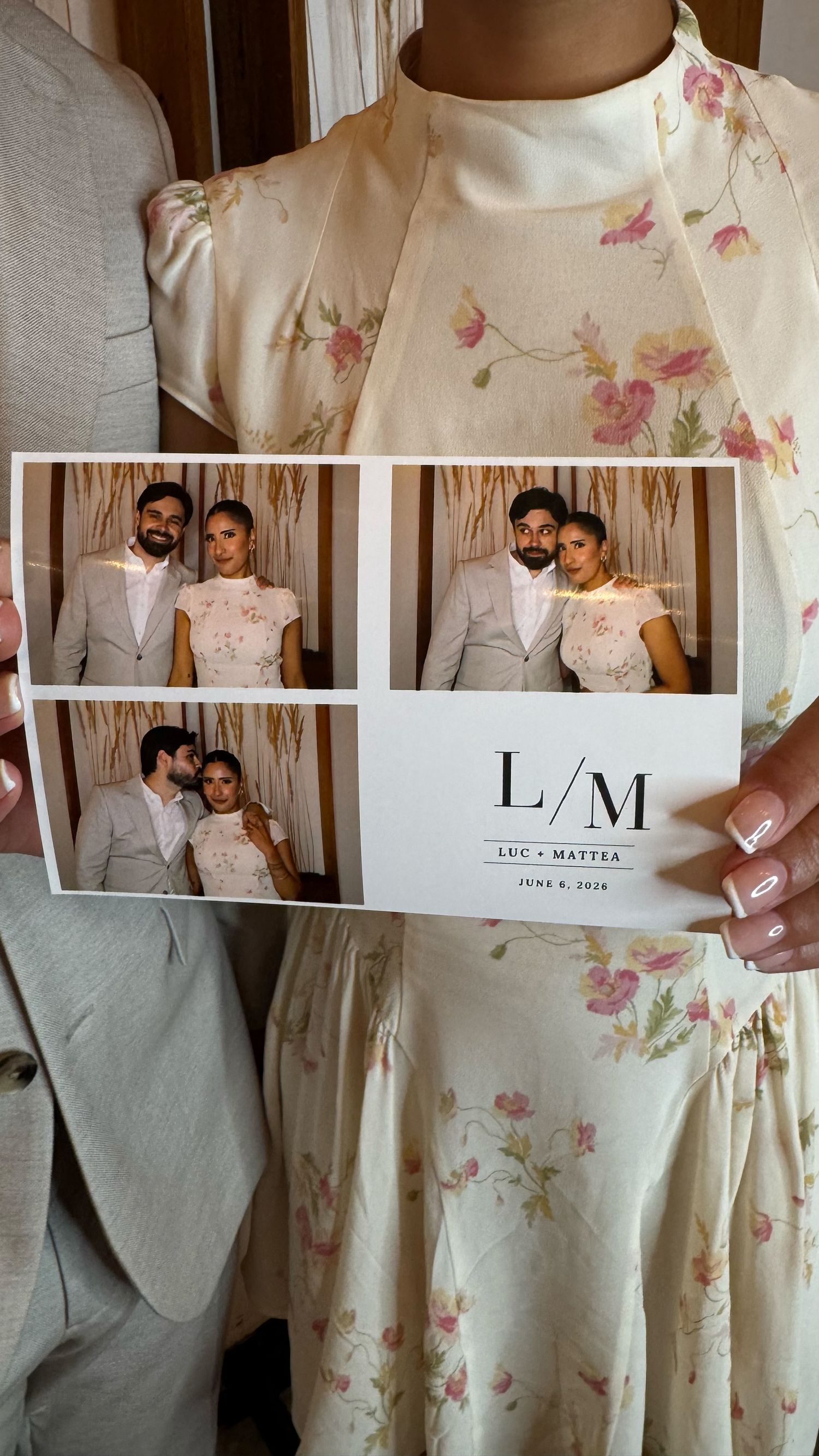 A wedding photo booth strip for Luc and Mattea, June 6 2024, held by a guest in a floral dress.