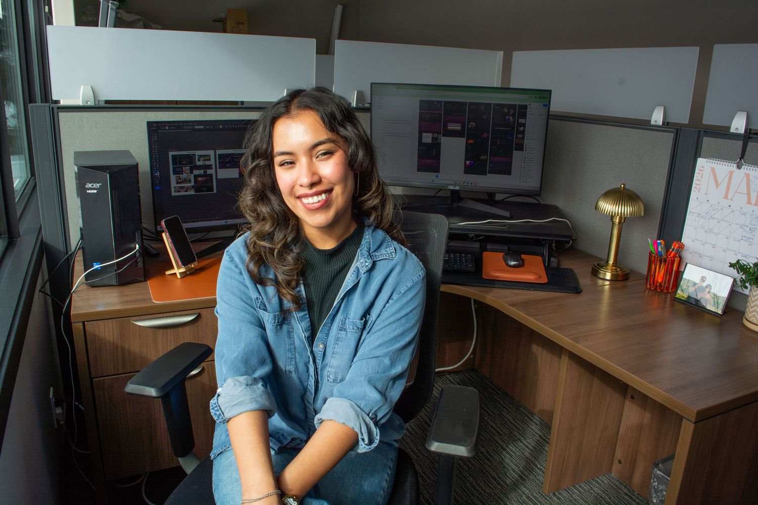 Viib Digital saint albert, st. albert, worker at her desk, smiling headshot and staff photo for small business website in alberta