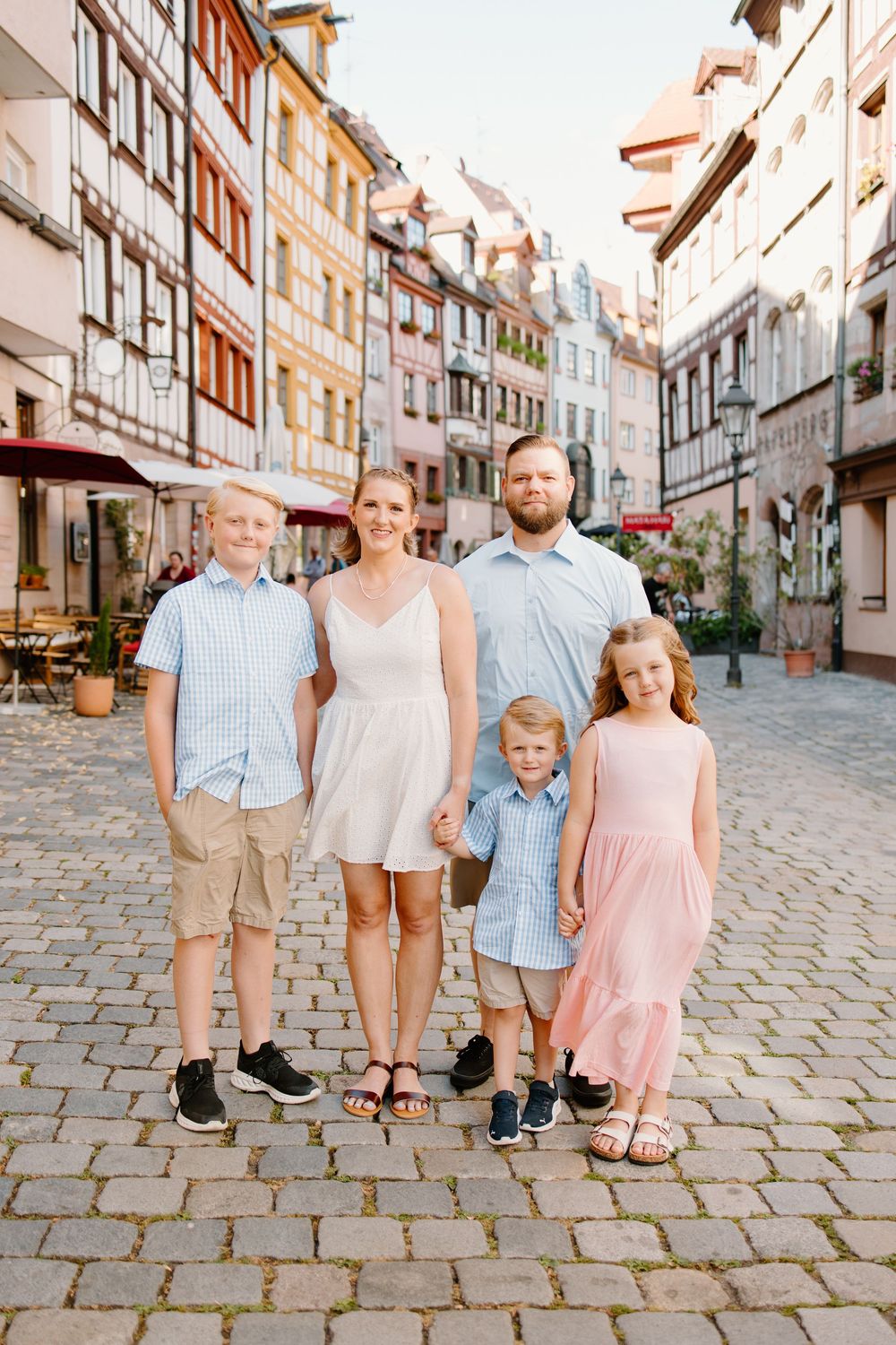 Family walking through Weißgerbergasse during Nuremberg family photoshoot