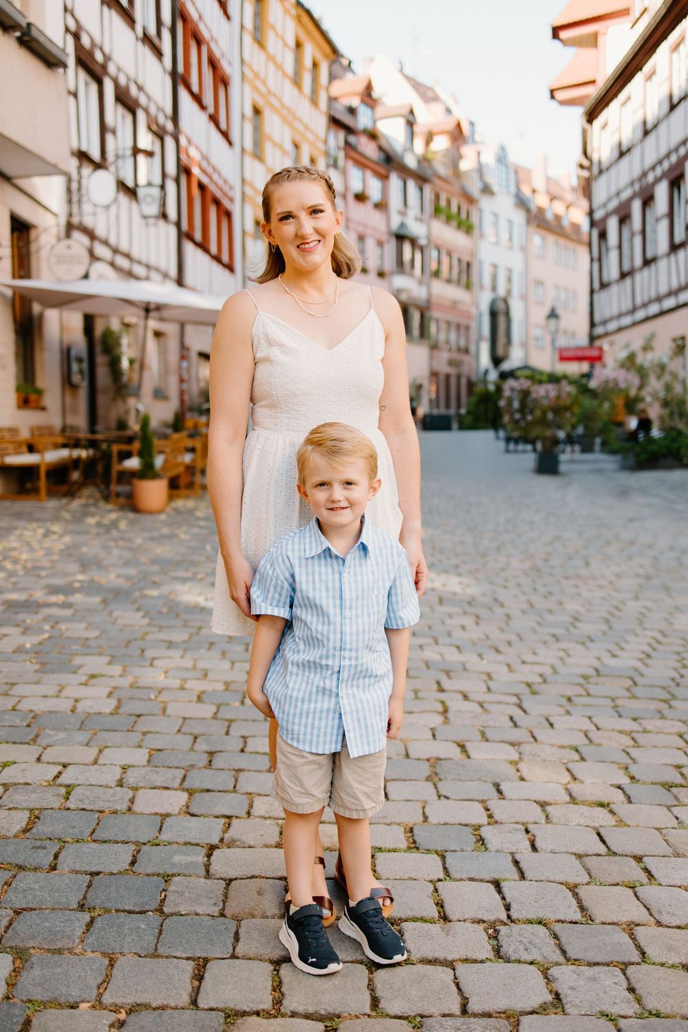 Family walking through Weißgerbergasse during Nuremberg family photoshoot