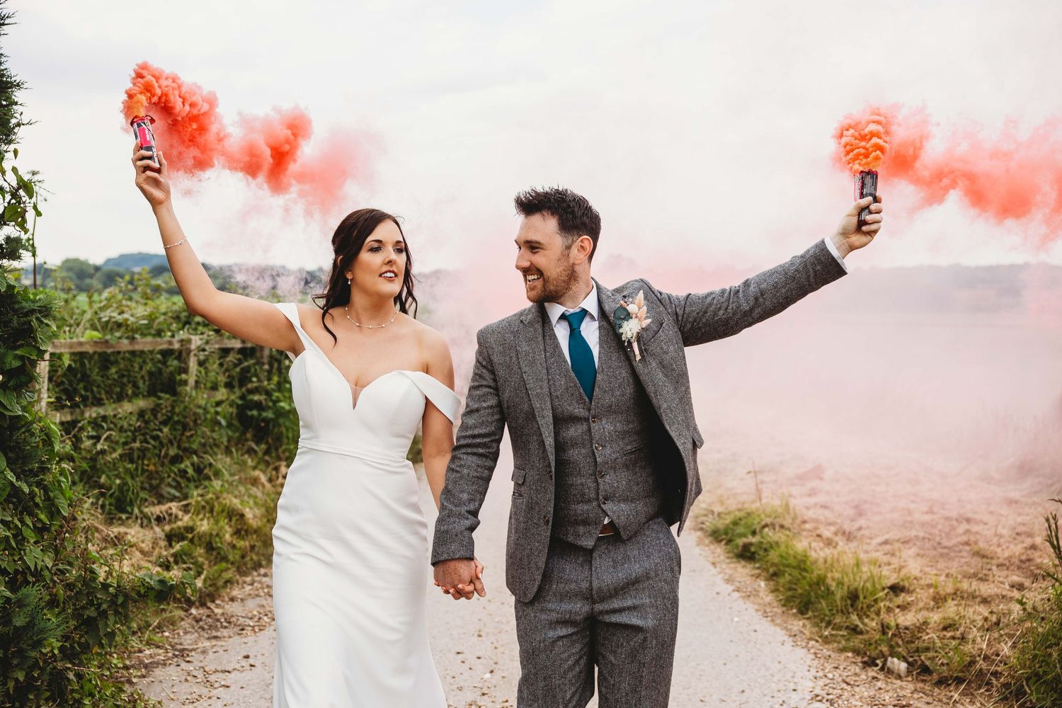 bride and groom portraits at swancar farm with smoke grenades
