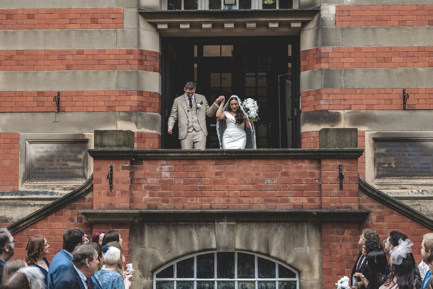 A couple celebrating their wedding after booking a great documentary wedding photographer