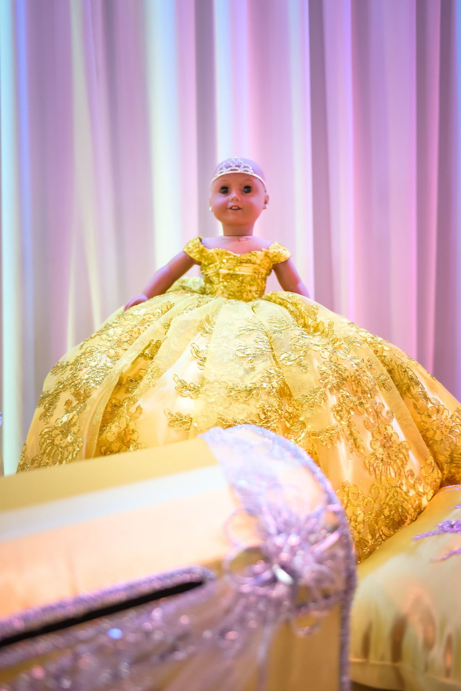 A Wish with Wings recipient Briana photographed in a stunning yellow Quinceañera gown by Dallas Fort Worth photography specialists.