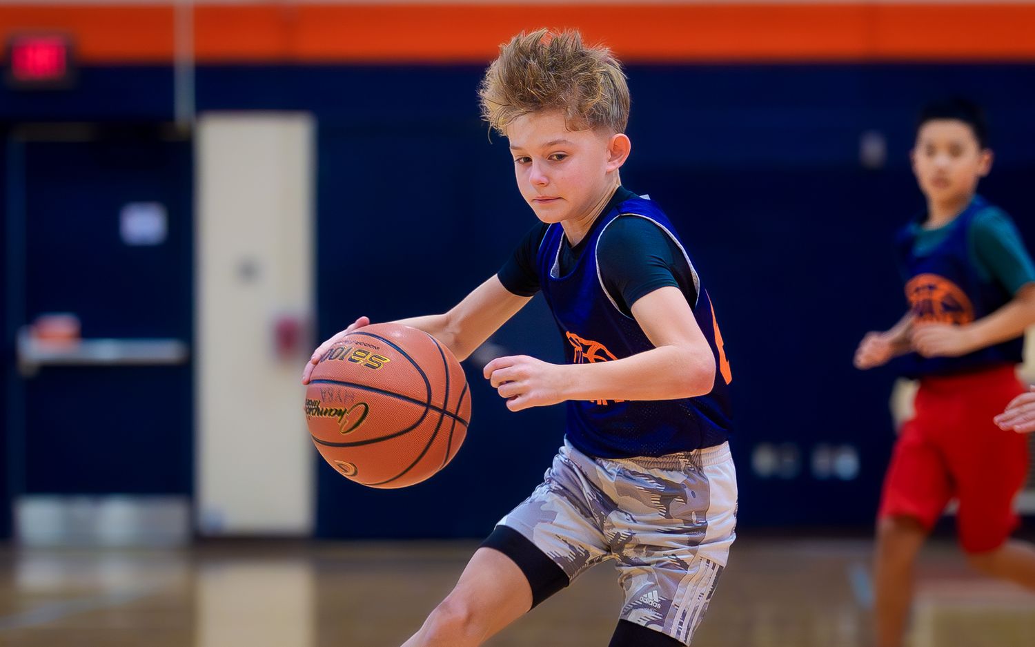 Hershey youth basketball player dribbling upcourt past a defender, HYBA, by Deanna Fox, SportsFox Photography based in Hershey PA