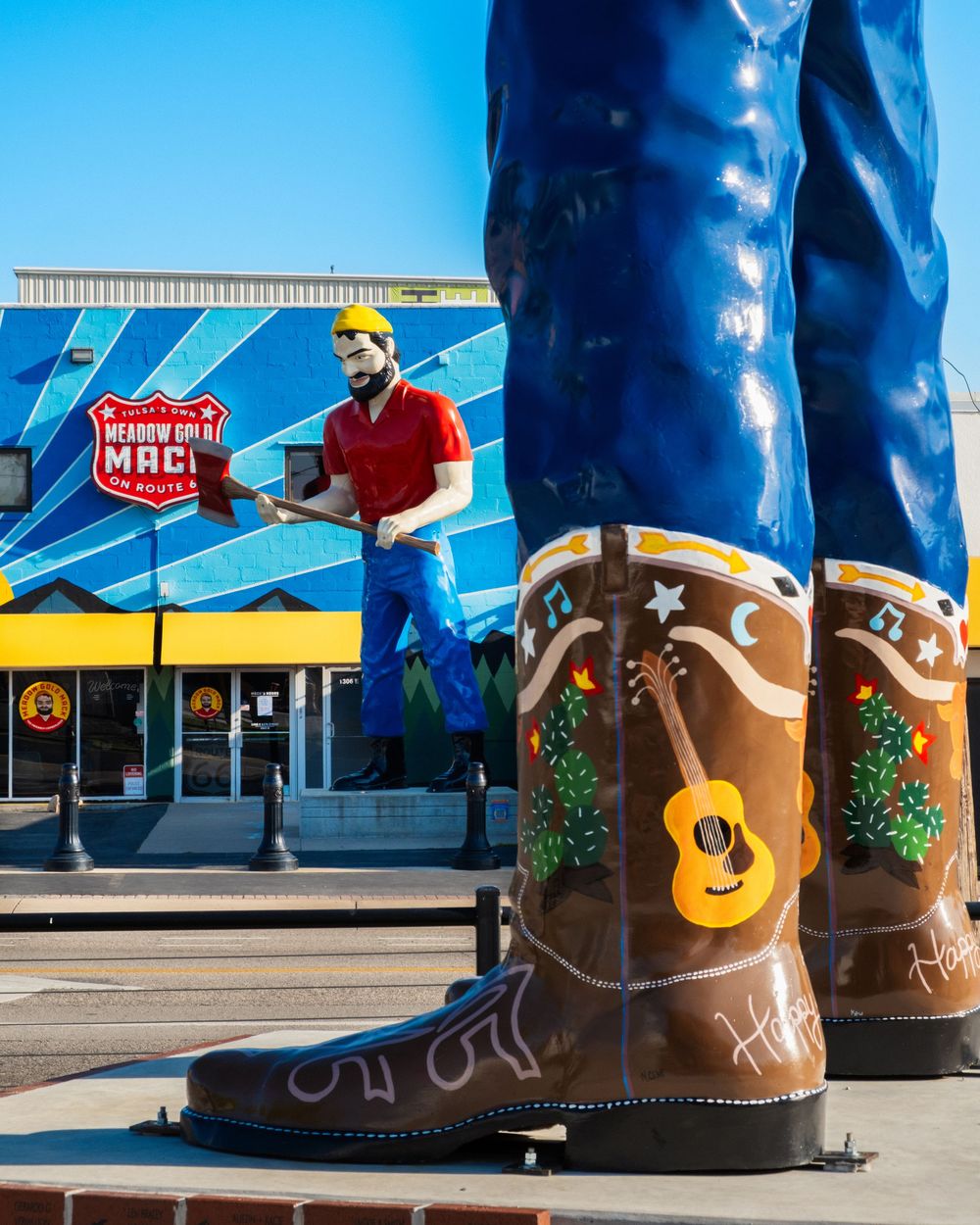 Meadow Gold Mack and Cowboy Bob's boots on Route 66 at Cosmic Curios in Tulsa, OK. June 10, 2026. (David J. Manning)