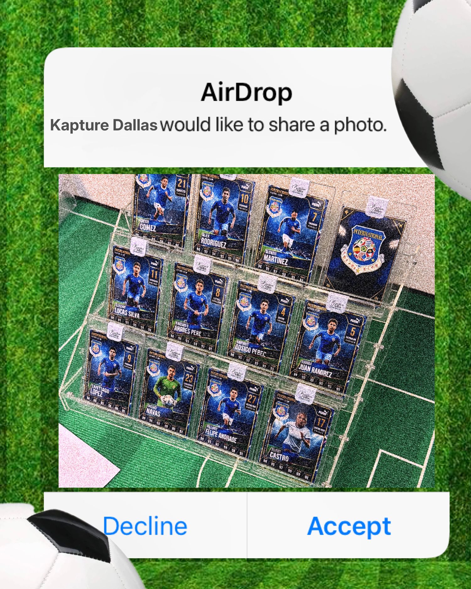 AirDrop notification showing soccer trading cards collection on green field background with Decline and Accept options.