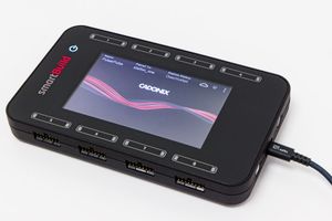 Cadonix SmartBuild controller with touchscreen display and USB connectivity on white background.