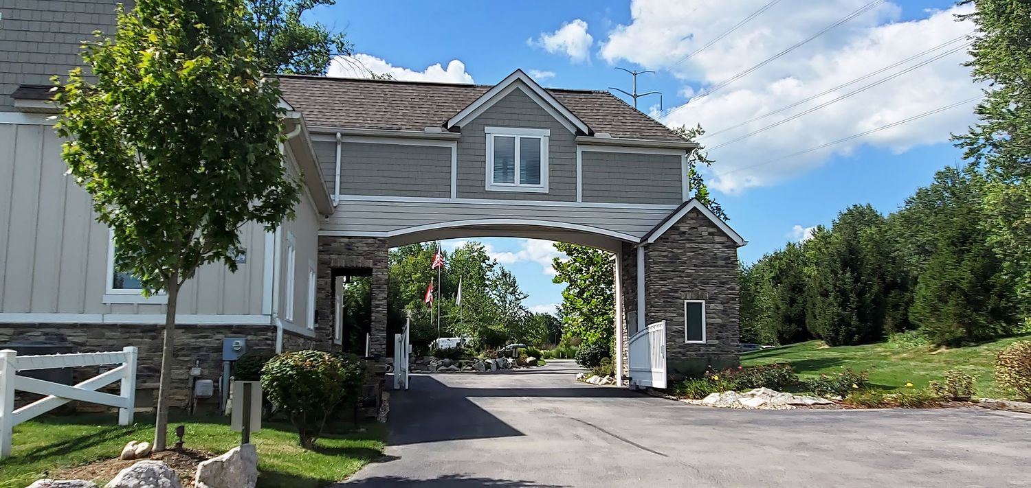Stone archway entrance gate of Swan Lake Event Center Wedding Venue
