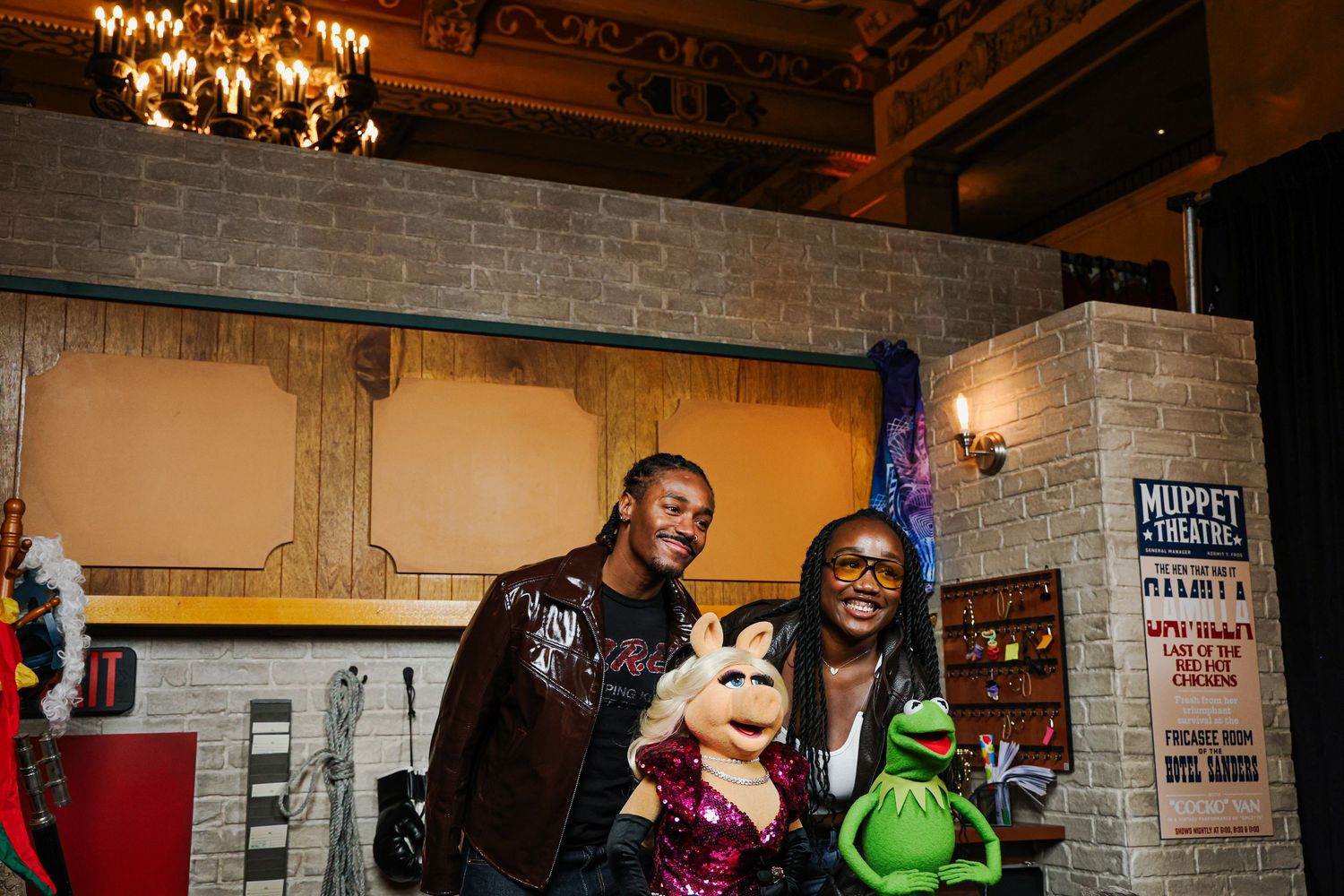 Influencers posing with Kermit the Frog and Miss Piggy at The Muppet Show premiere at The Roosevelt in Los Angeles. Hosted by Seth Rogen.