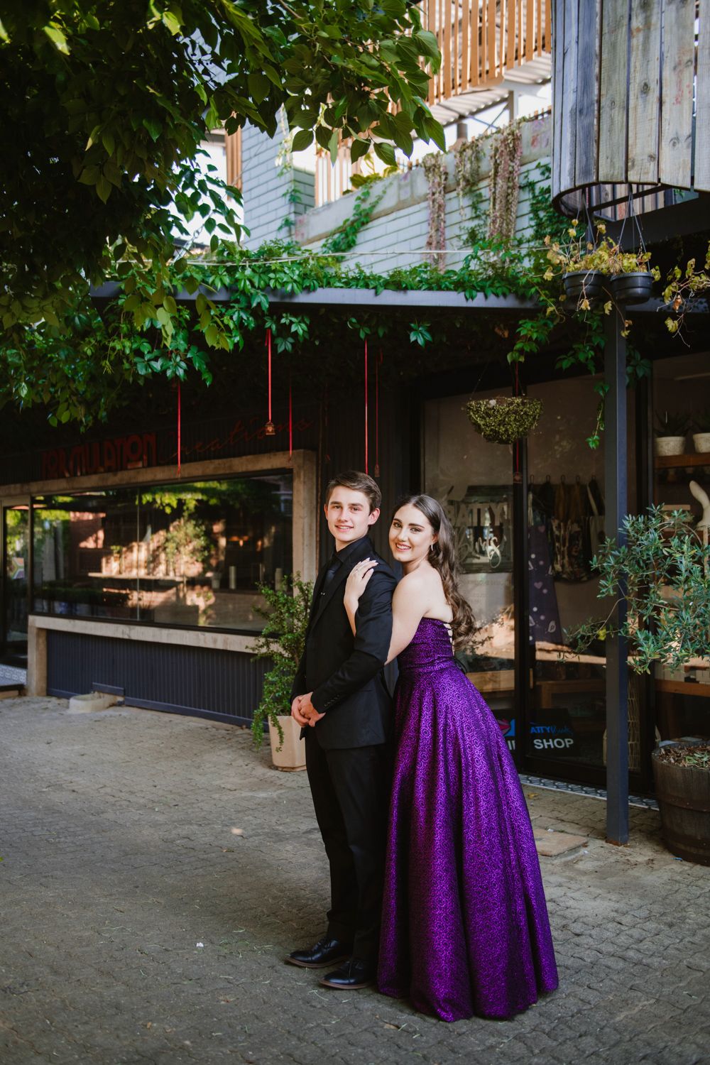 Long shot of an elegant couple ready for their Matriekafskeid celebration in Pretoria.