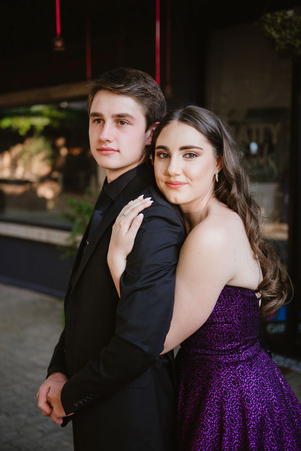 Couple posing for their matric dance pictures.