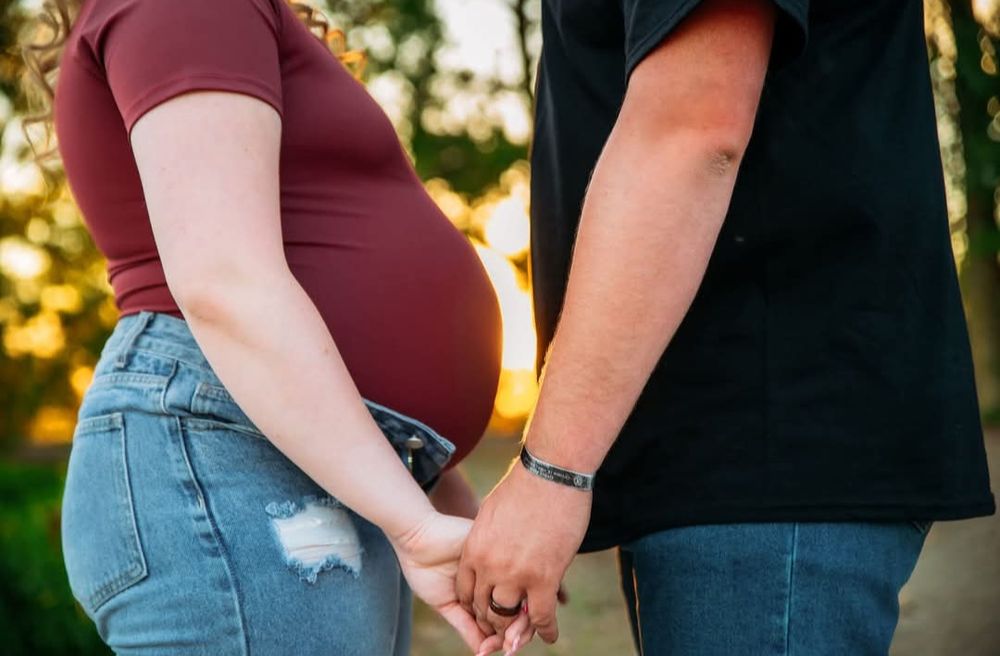 Couple celebrating their growing family during a West Central Ohio maternity session