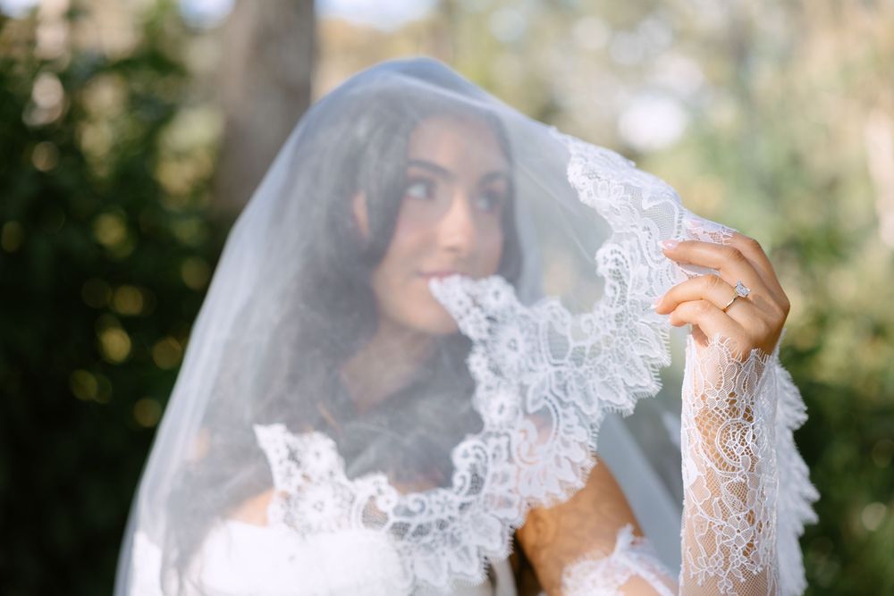 Bride under her veil a The Ranch 22 in lake worth