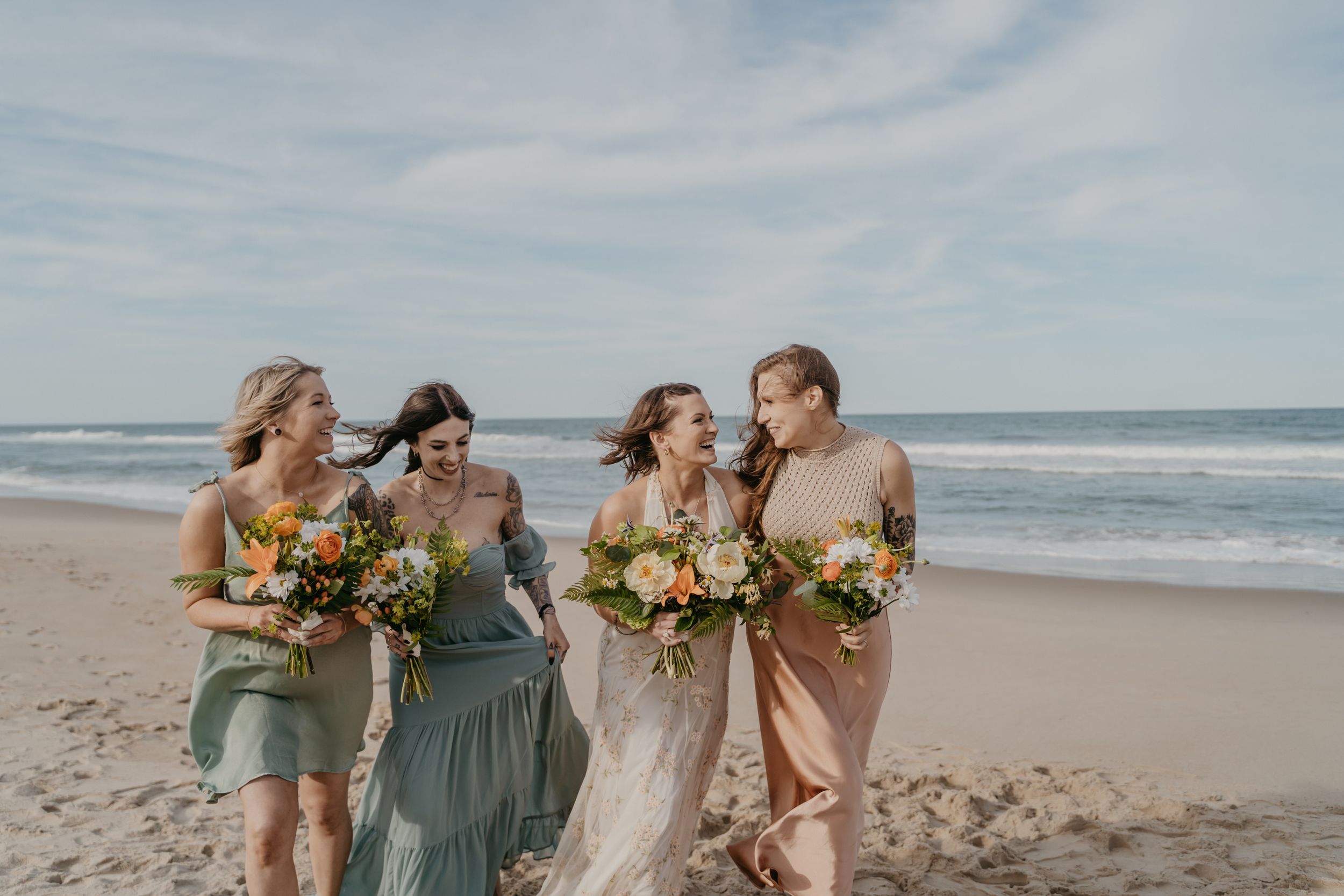 wedding couple posing on a beach in north carolina