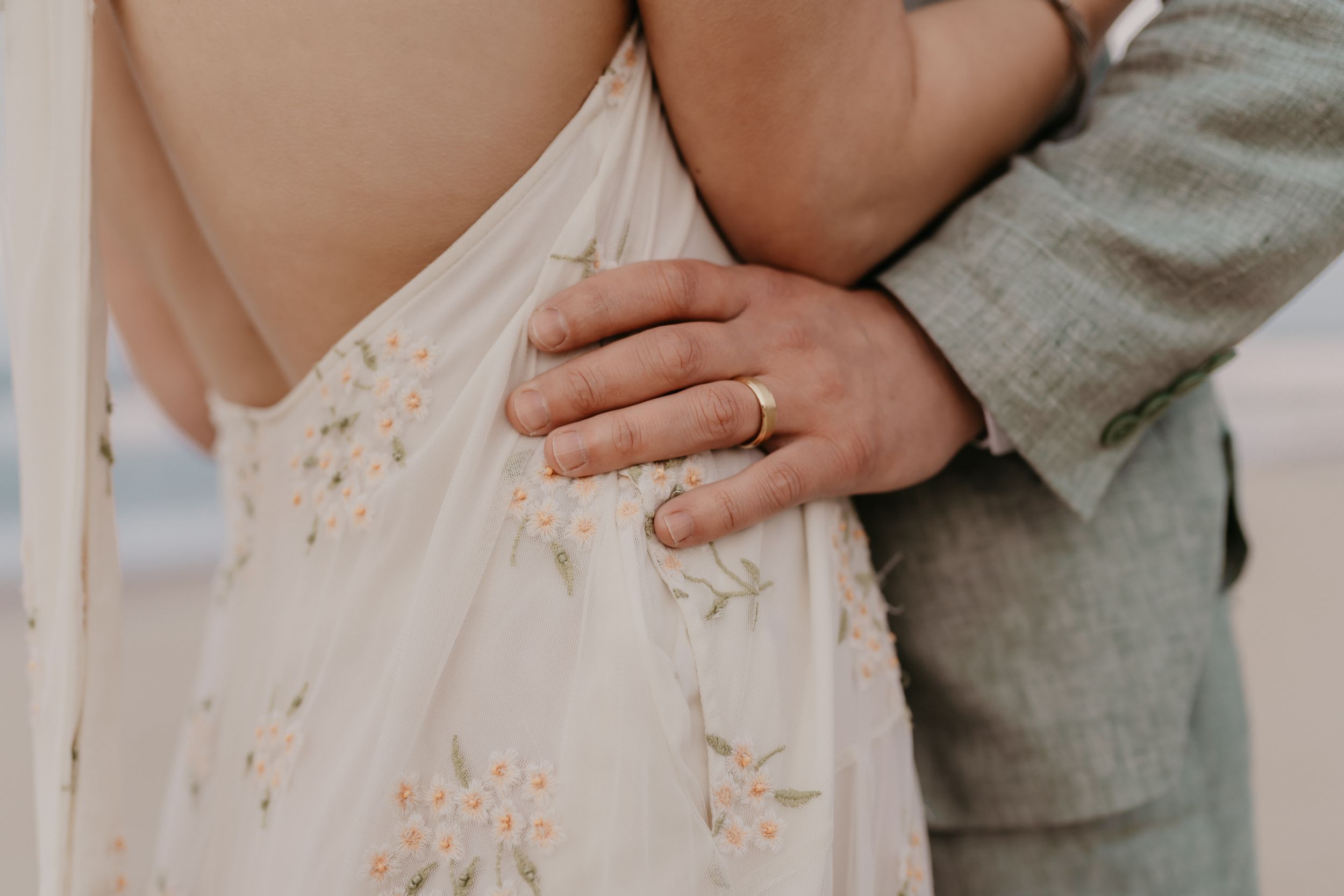 wedding couple posing on a beach in north carolina