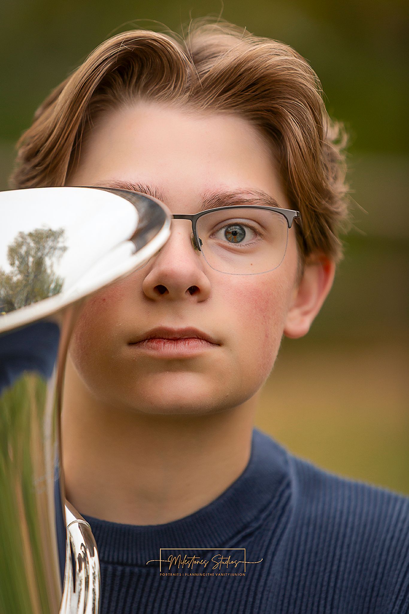 Senior portraits on the Boise River Greenbelt in Meridian, Idaho. Class of 2027 session with euphonium